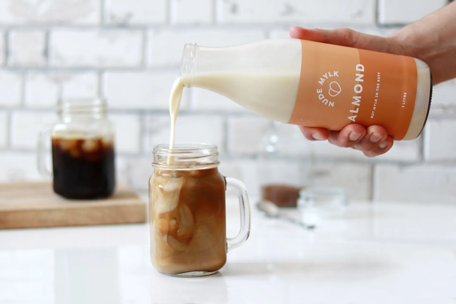 Fun Branding, Logo, and Packaging for Almond Milk Business